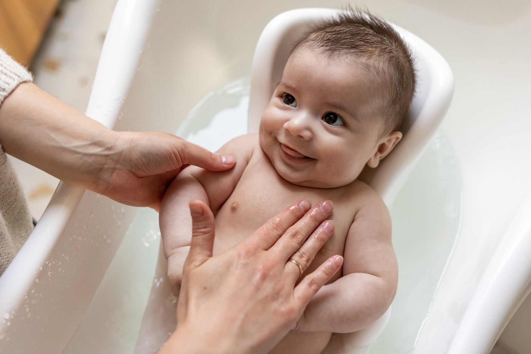 Baby taking the shower