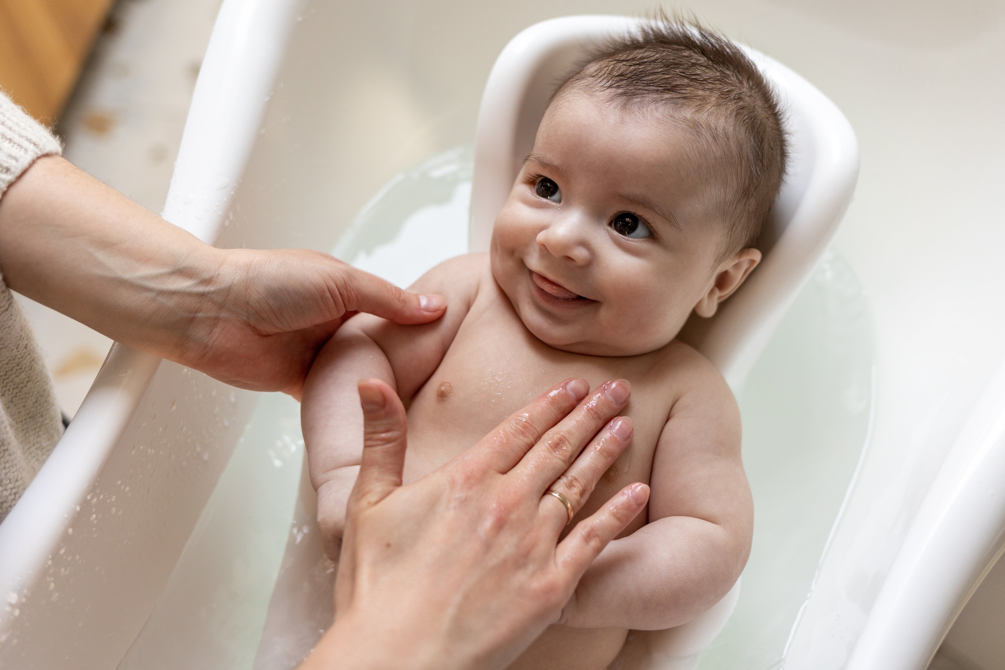 Baby taking the shower